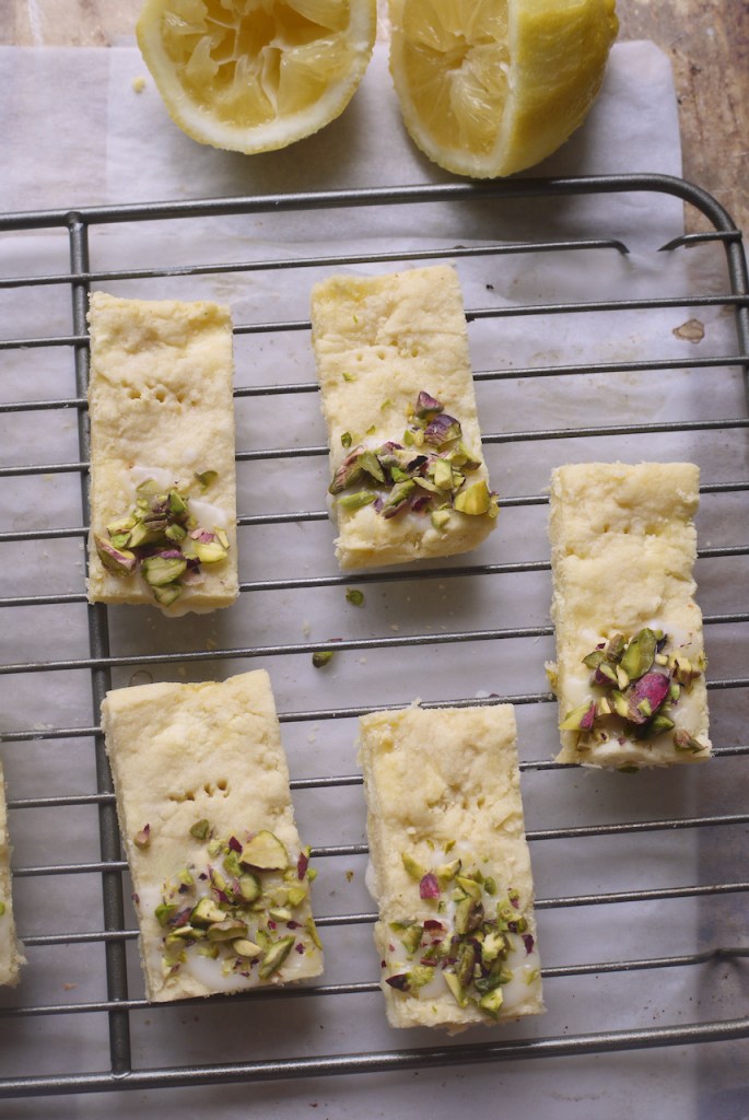 Biscuits cooling on a rack, with lemons nearby. This image links through to a web page with the recipe.