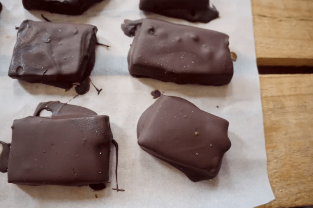 Chocolate dipped toffee. This image links through to a web page with this recipe.