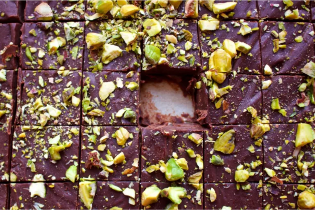 Pistachio chocolate fudge with one piece removed. This image links to the recipe for this dish.