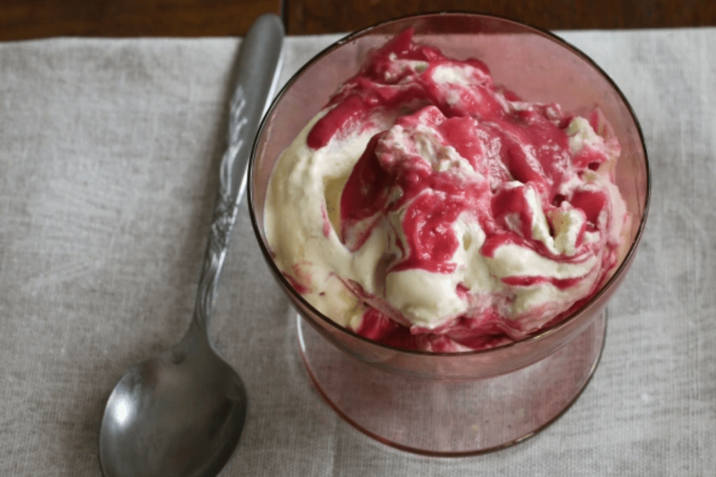 A bowl of ice cream rippled with cranberry curd. This image links through to a web page with the recipe.