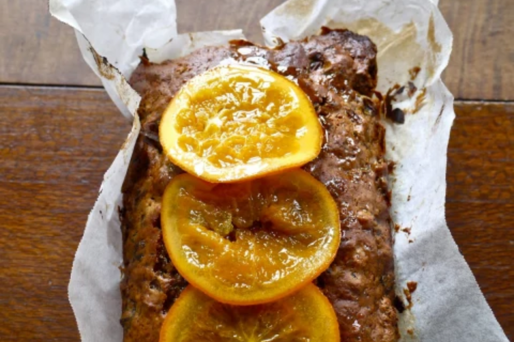 A loaf cake with orange slices on it. This image links through to a web page with the recipe.