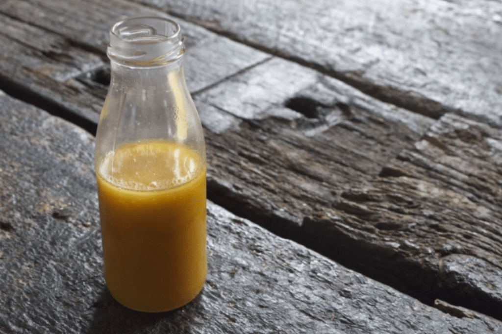 A bottle of honeycomb sauce on a table. This image links through to a web page with the recipe.