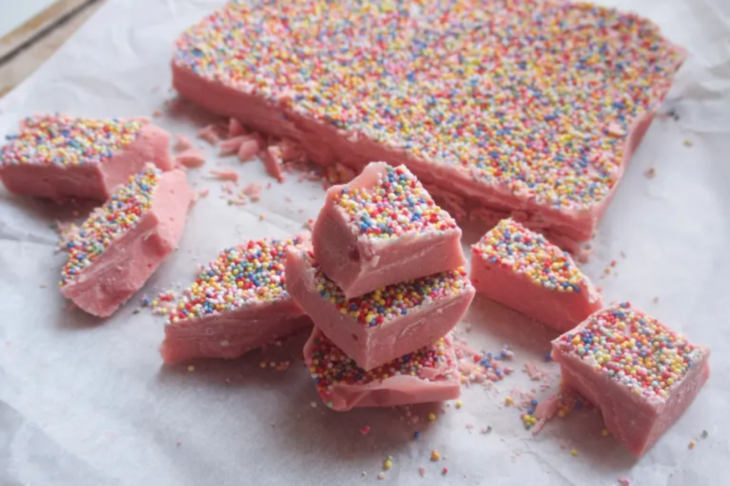 Pink chocolate with hundreds and thousands. This image links through to a web page with this recipe.