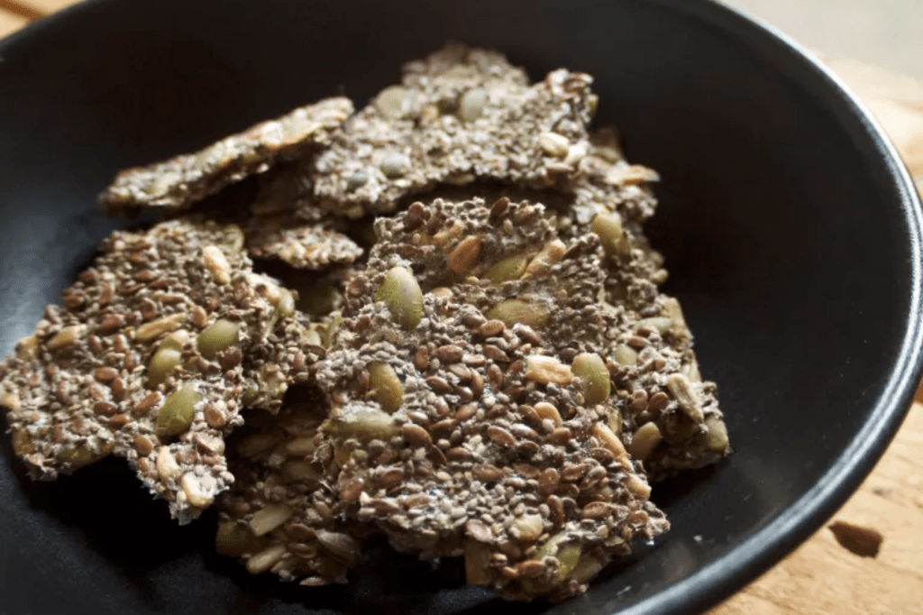 A black bowl of crackers. This image links through to a web page with the recipe.