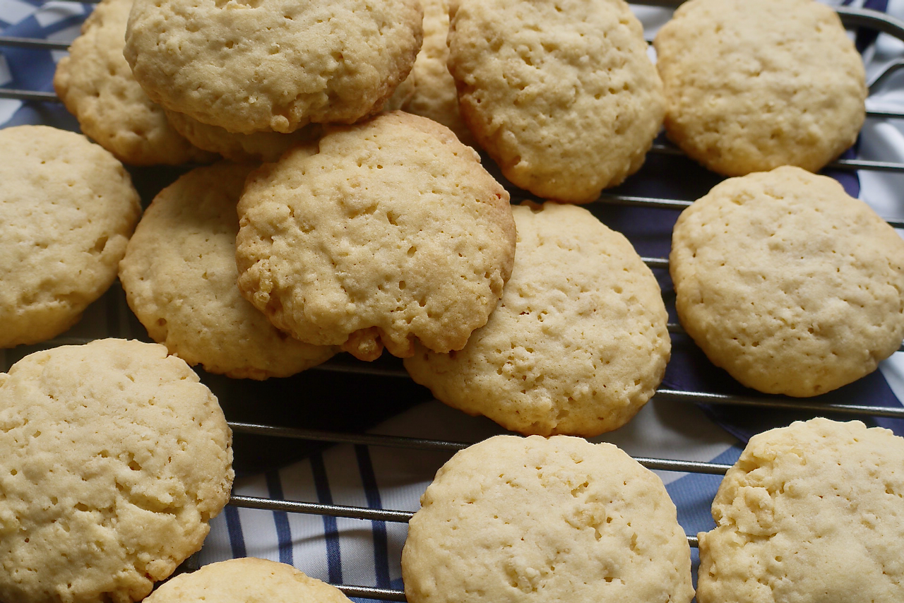 rice cookies piled up on a cooling rack