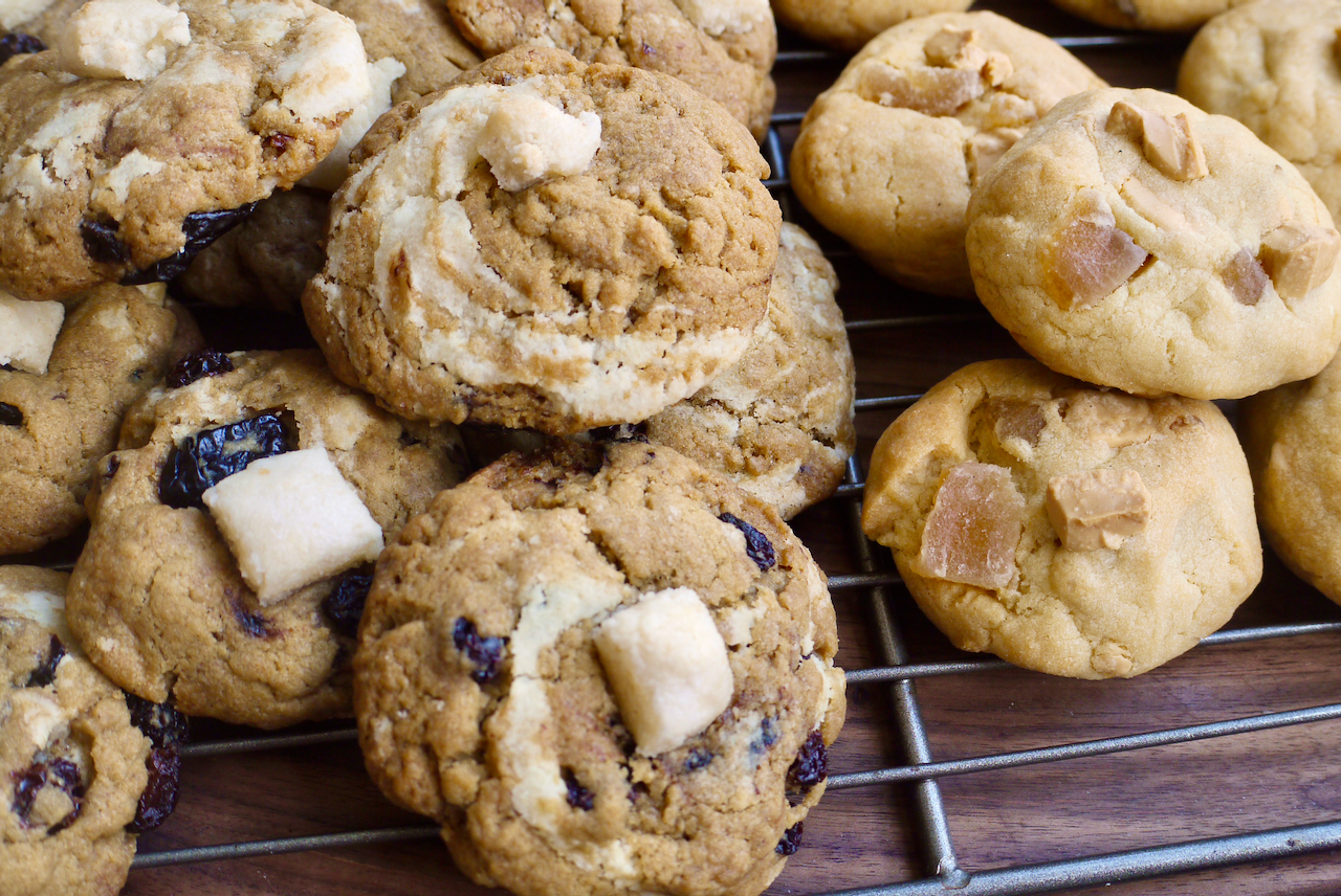 A pile of cookies on a cooling rack