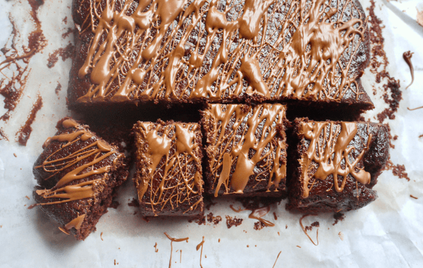 A chocolate cake with square slices cut from it. This image links to the recipe.