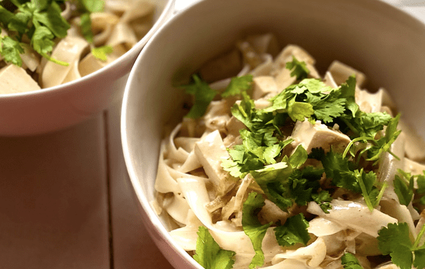 Two bowls of coconut chilli tofu noodles. This image links to the recipe.