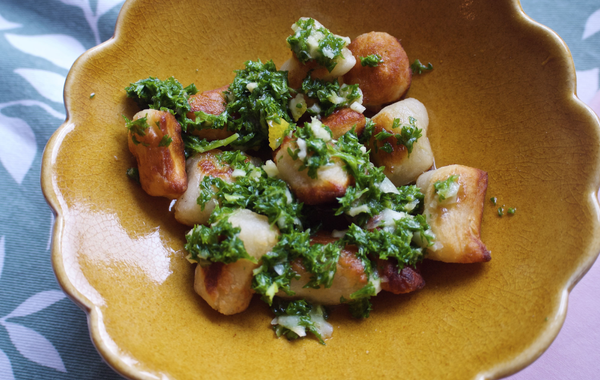 A fluted ochre bowl of gnocchi. This image links to the recipe.