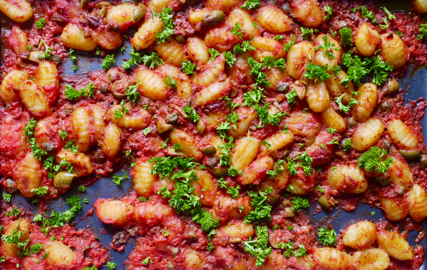 Sheet pan gnocchi puttanesca. This image links to the recipe.